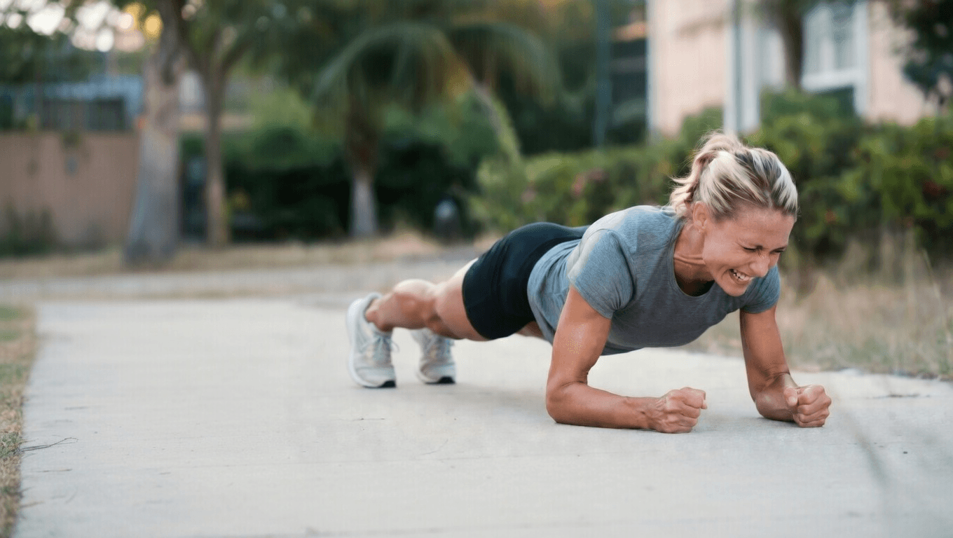 Woman holding a plank outdoors